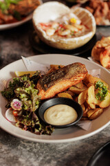 A big dinner party with a small group of friends. From many nationalities come to celebrate at this restaurant.