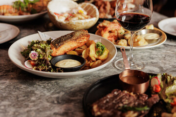 A big dinner party with a small group of friends. From many nationalities come to celebrate at this restaurant.
