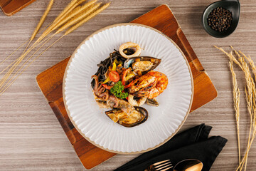 A big dinner party with a small group of friends. From many nationalities come to celebrate at this restaurant.