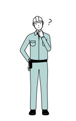 Man in helmet and workwear nodding his head in question.