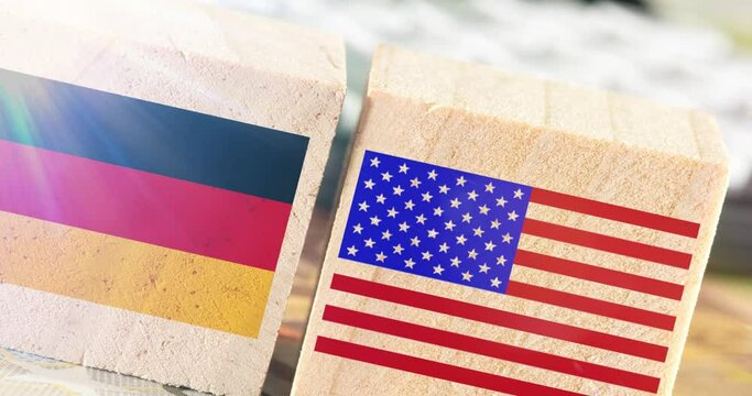 Flaggen vom Deutschland und USA, Euro Geldscheine und ein Taschenrechner