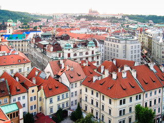 Obraz premium View from height of Old Town Hall to adjacent city in the old part of the Prague city in the Czech Republic