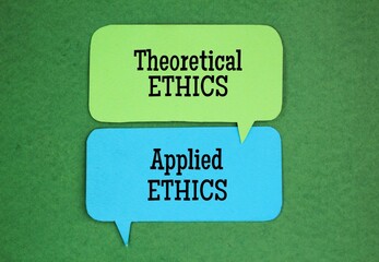two paper boxes with the words Theoretical ethics and applied ethics