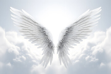 Obraz premium A pair of white wings soar through a cloudy sky, showcasing freedom and grace in their flight