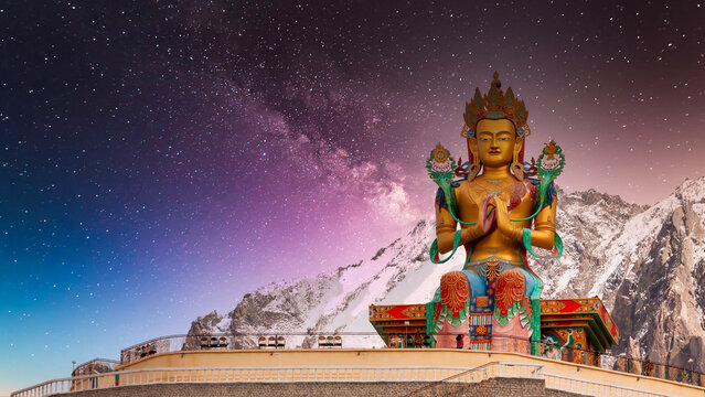 The Maitreya Buddha statue with Himalaya mountains, Diskit Monastery or Diskit Gompa, Diskit Monastery also known as Deskit Gompa or Diskit Gompa Nubra valley, Leh Ladakh, India.