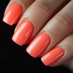 Obraz premium Cajun Shrimp nails, a vibrant summer trend. Glossy, reddish-orange manicure adds a touch of sunshine.