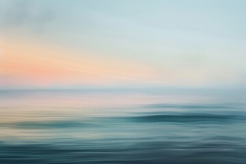 Abstract seascape at sunset with calm ocean waves and soft pastel colors creating a peaceful and serene atmosphere.