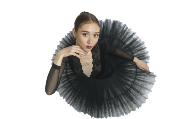 portrait of a young ballerina in a black tutu dancing with her hands moving top view, immersion in dance, isolated on transparent background, png
