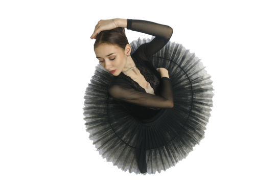 portrait of a young ballerina in a black tutu dancing with her hands moving top view, immersion in dance, isolated on transparent background, png