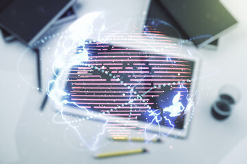 Double exposure of abstract digital world map with connections and modern digital tablet on...