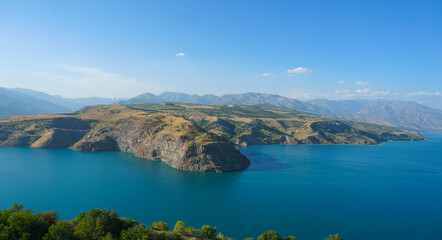 Fototapeta premium A large reservoir between the mountains