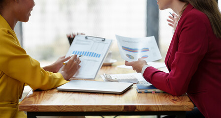 Confident African American team leader teaching employees Advice for business women Colleagues...