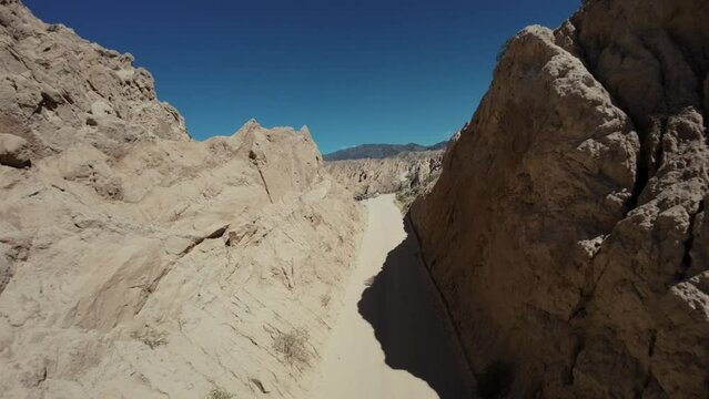 Panoramic aerial image of the "Quebrada de las Flechas" on the mystical Ruta 40 in Salta, Argentina, South America, amidst the Andes Mountains.