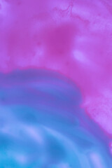 abstract background: liquid mix of blue and purple paints