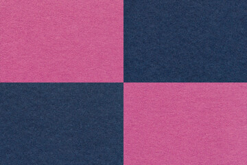 Fototapeta premium Texture of craft purple and navy blue paper background with cells pattern, macro. Vintage kraft magenta cardboard.