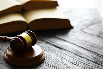 Judges gavel on wooden desk. Law firm concept.
