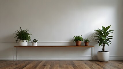 White, empty space with plants and a hardwood floor.