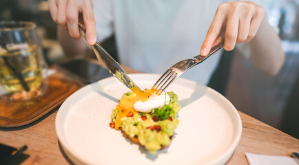 Guacamole avocado healthy food and asian woman background at indoor restaurant on day