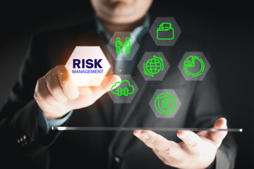 Risk management concept. Assessment and analysis by professional auditing consultant concept, person touching the screen with icons of risk evaluation. Risk management strategy