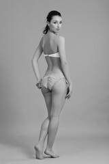 young gorgeous blond woman in swimsuit