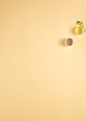 Minimalist food background with mustard seeds and olive oil, copy space. Perfect for recipe layouts and culinary blogs