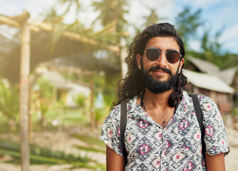 Happy man, portrait and tourist with smile, island and holiday or summer vacation in hawaii. Male...