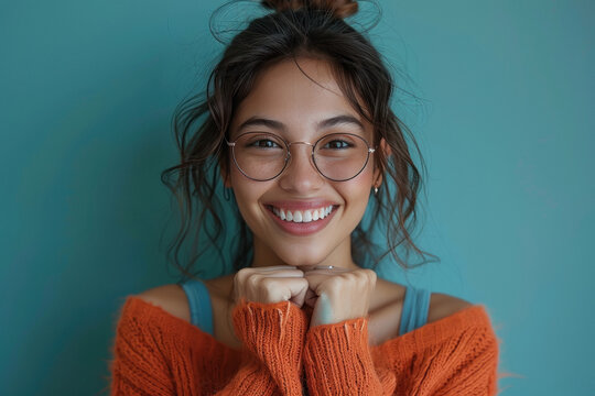Young indian woman giving happy expression
