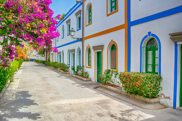 Scenic Summer Alley in the Harbor Area of Puerto de Mogan at Daytime at Gran Canaria in Spain...