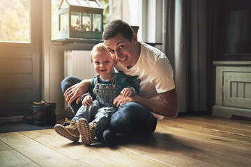 Portrait, man and child in living room for love, family and happiness in home together. Dad, young...