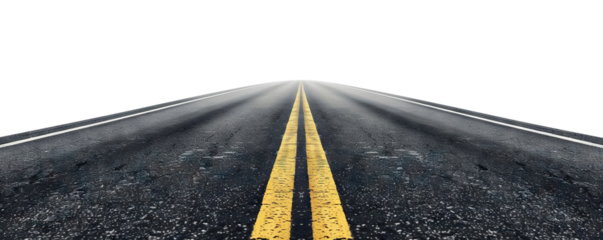 Deserted highway with yellow center lines extending into foggy horizon, cut out