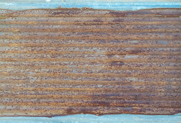 Old galvanized sheet background with rust pattern. Used for decorating the walls of restaurants, coffee shops, vintage style, cowboy style, backdrop.