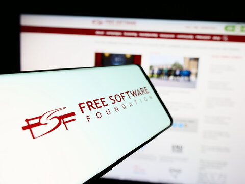 Stuttgart, Germany - 05-22-2024: Smartphone with logo of American organisation Free Software Foundation (FSF) in front of website. Focus on center-left of phone display.