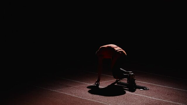 Professional Runner On Start, Sprinter Leaning On Starting Blocks And Running Forward, Workout