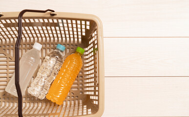  Drinks in the shopping cart. Shopping, drinks, plastic bottles, water, buying, preparing,...