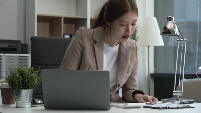 young Asian businesswoman, dressed in a formal suit, navigates complexities of the stock market as a consultant, loan officer, financial advisor, embodying entrepreneurship and strategic prowess.