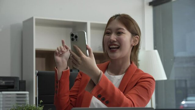 young Asian businesswoman, dressed in a formal suit, navigates complexities of the stock market as a consultant, loan officer, financial advisor, embodying entrepreneurship and strategic prowess.