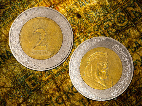 Close-up of a Saudi Arabia 2 riyals coin.