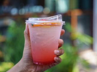 cup of strawberry juice soda