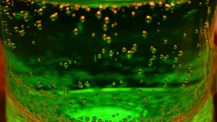 Carbon dioxide. The release of carbon dioxide from beer or soda through a glass beaker - Powered by Adobe