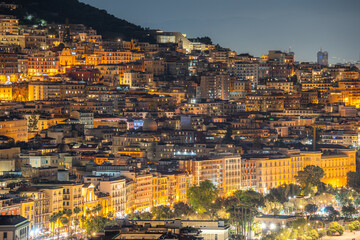 The many houses built on the hillside in Naples. in the night