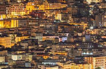 The many houses built on the hillside in Naples. in the night