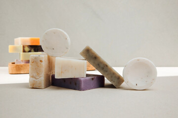 Handmade soap from natural ingredients, various herbs. Concept of sustainable use, bath products. Front view