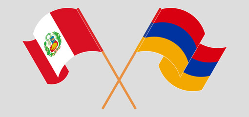 Crossed and waving flags of Peru and Armenia