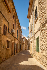 Pollensa is a historic medieval little town with colorful narrow streets and historic buildings in the north of the island of Majorca, Balearic Islands, Spain