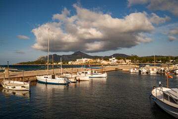 Little port with typical Majorcan fishing boats called Llaut in Es Barcares, Alcudia, Majorca, Balearic Islands, Spain
