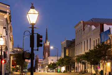 Natchez, Mississippi, USA - April 21, 2024: Twilight light descends on a quiet downtown Natchez...