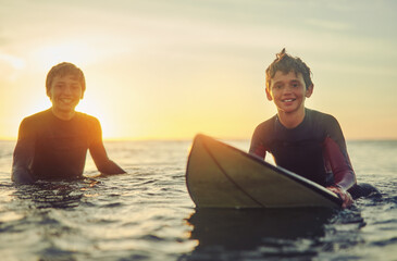 Beach, smile and portrait of boys with surfboard for holiday, outdoor adventure and fun weekend...