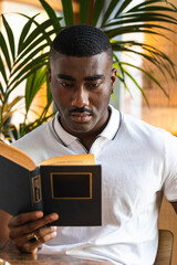 African man with a book