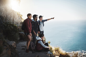 Outdoor, pointing and people in mountain for hiking, adventure and natural environment in Canada. Friends, trekking and walking in nature to explore, experience and relax with peace together