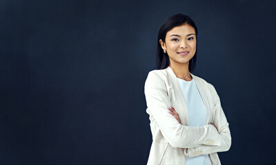 Asian businesswoman and smile in portrait with mock up and crossed arms for confidence in career as...